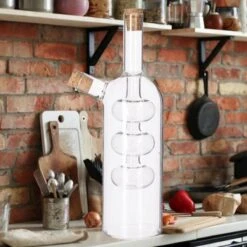 Merkloos Decopatent® 2in1 Olie En Azijnstel Glas - Bolvorm Met Kurken - Glazen Azijnfles & Oliefles In 1 - Oil And Vinegar - 9 X 9 X 21 Cm -Merkloos Verkoopwinkel 1200x1200 2854